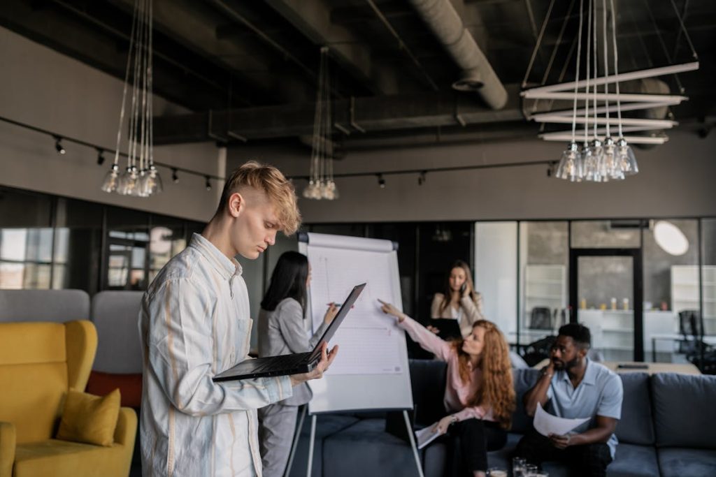 Team members working in an open office space